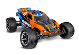 Traxxas Rustler 2WD HD remote control truck with orange body and detailed features, shown from a three-quarter angle.