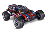 Red Traxxas Rustler 2WD BL-2s HD RC truck front three-quarter view showing wheels and body details.