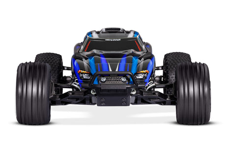Front view of a blue Traxxas Rustler 2WD BL-2s remote control truck with rugged tires and detailed body design.