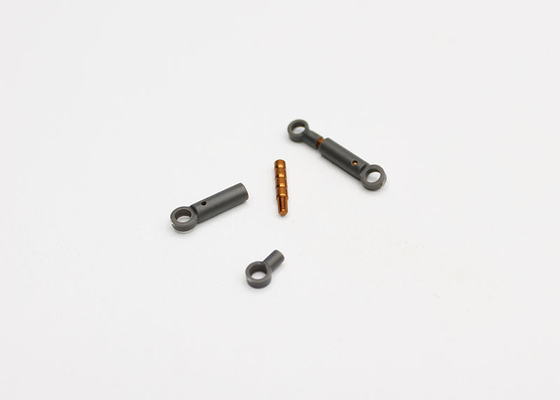Reflex Racing RX28G2 RC car side dampers, black metal suspension components, shown installed on RC vehicle in detailed close-up.