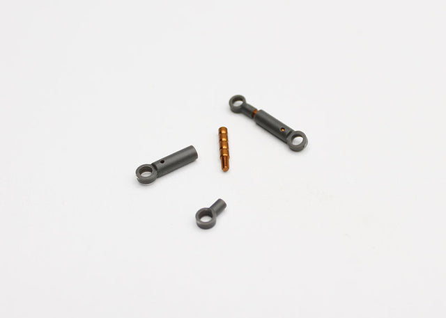 Reflex Racing RX28G2 RC car side dampers, black metal suspension components, shown installed on RC vehicle in detailed close-up.