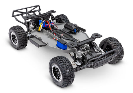 Traxxas Slash 2WD VXL RC truck front and 3/4 chassis view showing detailed suspension and body design.