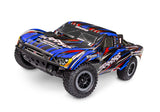Traxxas Slash 2WD BL-2s remote control truck showing a three-quarter front view with blue body and detailed design.