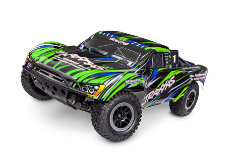 Traxxas Slash 2WD BL-2s RC truck with green body, showing the front three-quarter view and detailed design features.
