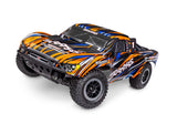 Traxxas Slash 2WD BL-2s remote control truck with orange body, front view showing sporty design and off-road tires.