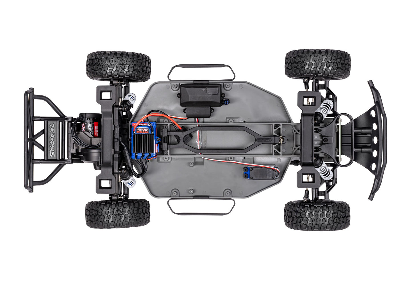 Overhead view of Traxxas Slash 2WD BL-2s RC truck chassis, showing detailed black and red components and suspension parts.