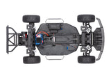 Overhead view of Traxxas Ford Raptor 2WD BL-2s RC truck chassis showing detailed black and silver components.