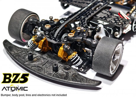 Atomic RC Z5 Belt Drive 4WD RC car chassis kit with black and silver components, showcasing the detailed assembly and drivetrain.