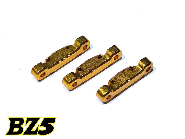Atomic RC BZ5 aluminum rear arm mounts, set of 3, with black anodized finish for RC car suspension upgrade.