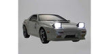 Kyosho First Mini-Z RC Mazda RX-7 FC3S Ryosuke Takahashi car part with detailed design and light accents on a white background.