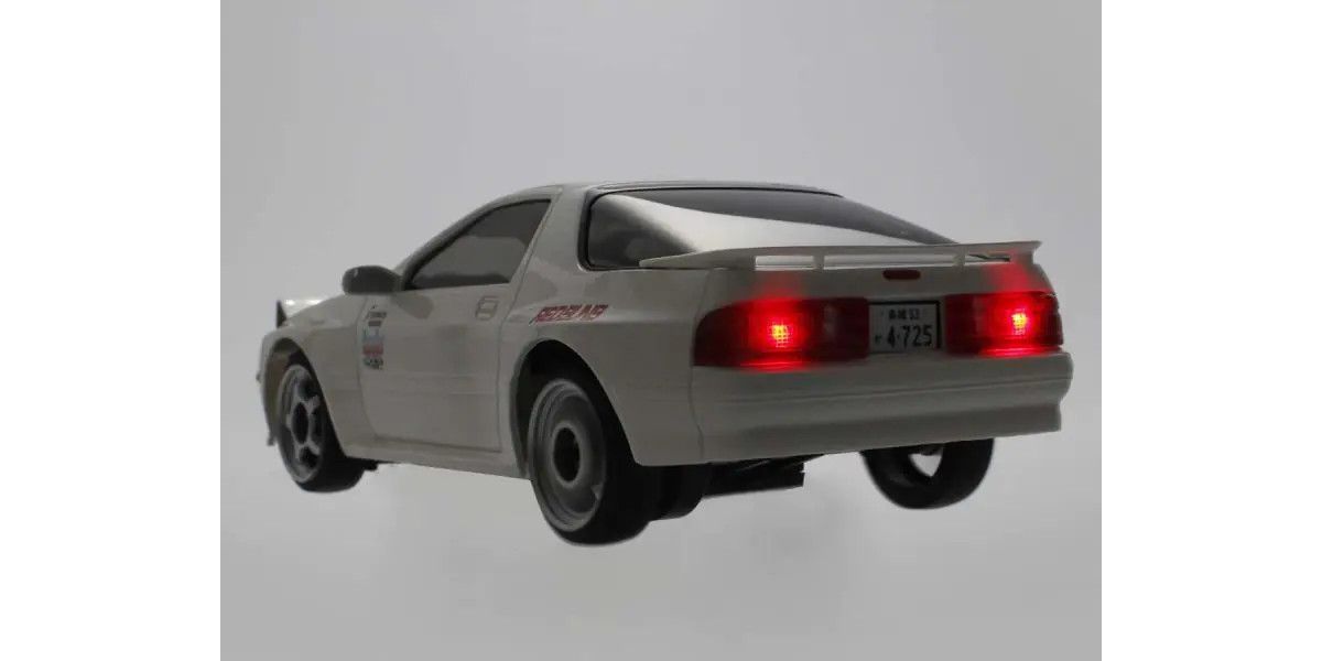 Kyosho First Mini-Z Initial D Mazda RX-7 FC3S Ryosuke Takahashi RC car parts with detailed exterior and branding.