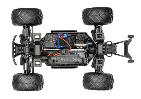 Overhead view of the Traxxas 1/10 Bigfoot 50th 4x4 RTR brushless BL-2s chassis showing off the rugged off-road design.