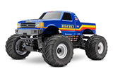 Traxxas Bigfoot 4x4 BL-2S remote control monster truck front quarter view showing rugged tires and bright red body.