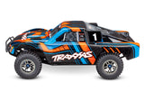 Traxxas Slash 4X4 VXL Ultimate RC truck with orange body, side view showing rugged tires and detailed design.