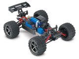 Traxxas 1/16 E-Revo VXL 4X4 RC truck chassis with detailed suspension and electronic components visible in the image.
