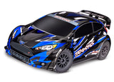 Blue Traxxas Ford Fiesta ST Rally BL-2s remote control car on a white background with detailed body and rally car design.