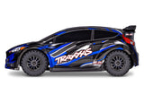 Blue Traxxas Ford Fiesta ST Rally BL-2s radio-controlled car viewed from the side.