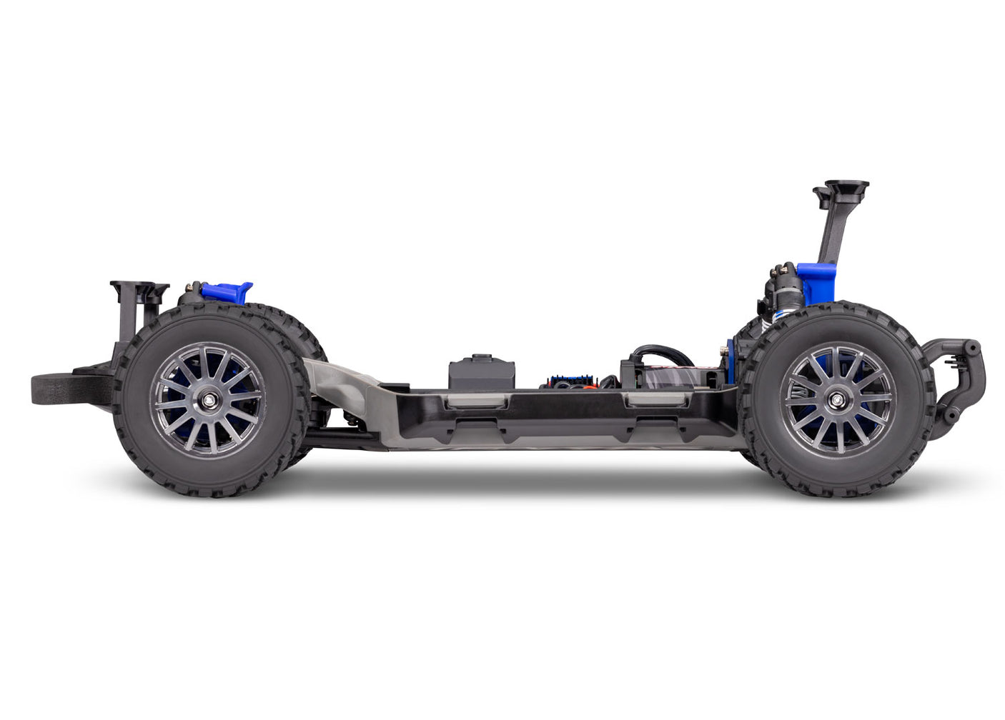 Traxxas Ford Fiesta ST Rally BL-2s radio-controlled car side chassis view showing detailed rally car design and vibrant blue accents.