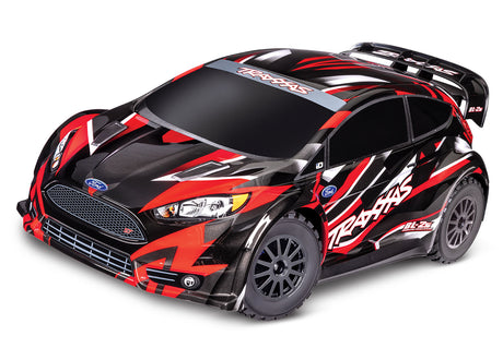Red Traxxas Ford Fiesta ST Rally BL-2s RC car with detailed exterior and rally car design, ready for off-road racing.