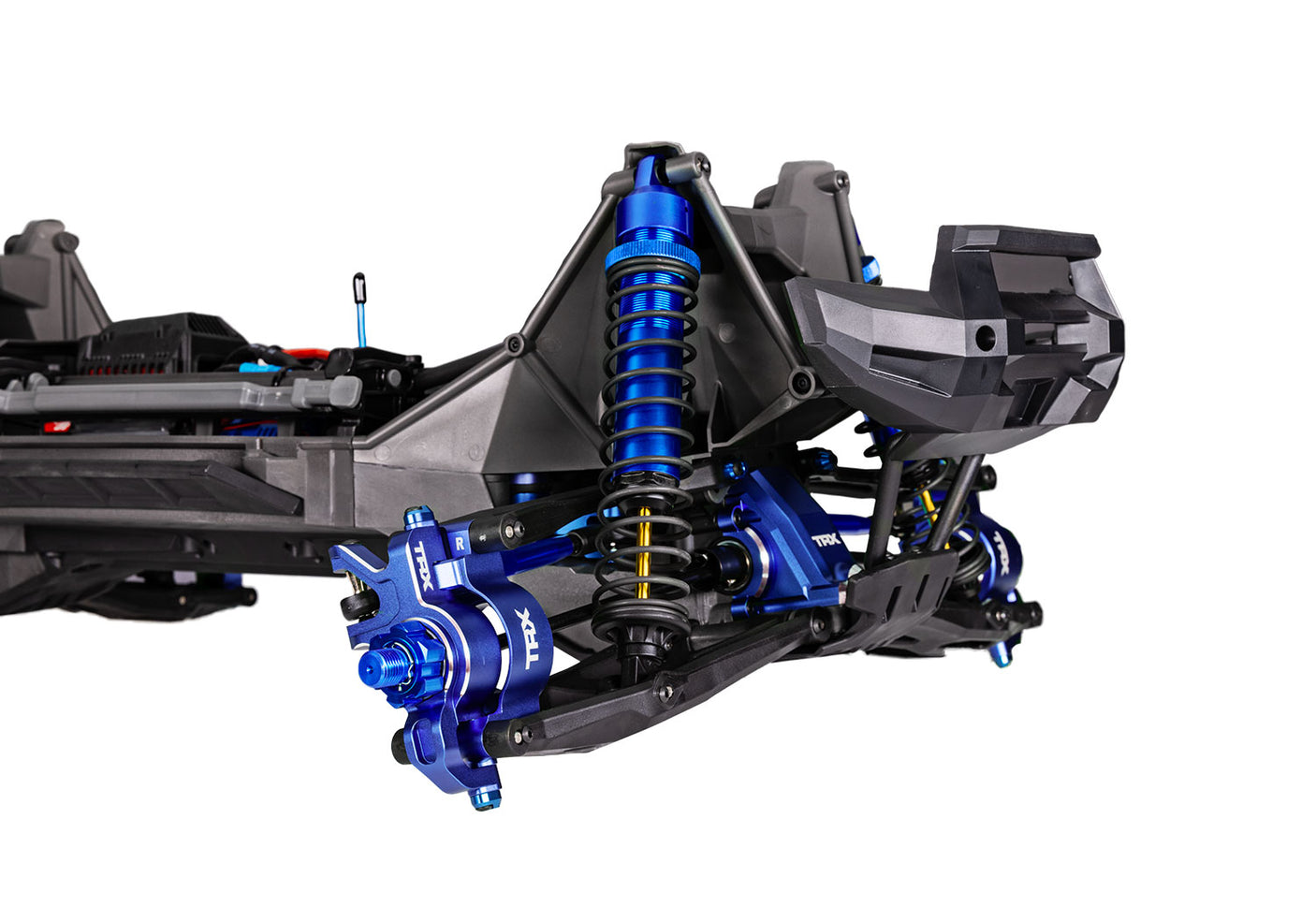 Traxxas X-Maxx Ultimate remote control monster truck with blue front suspension and large tires.