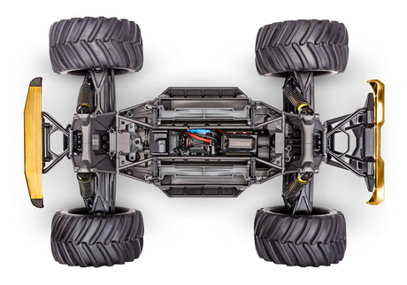 Traxxas X-Monster Bigfoot 50th anniversary RC monster truck chassis, overhead view showing detailed components and design features.