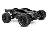Traxxas XRT 8S RC truck in orange, front three-quarter view showing rugged off-road design and large tires.