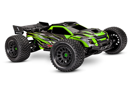 Traxxas XRT 8S off-road RC truck in orange, showing the front quarter view with rugged tires and detailed body design.
