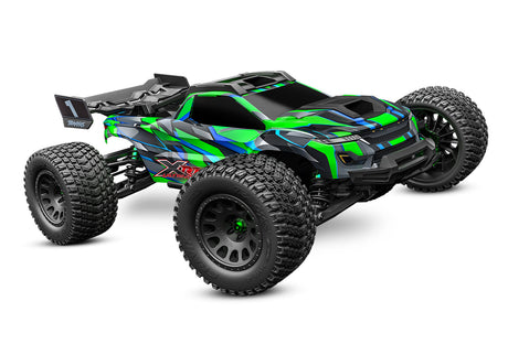 Traxxas XRT Ultimate off-road RC truck with green body, large tires, and detailed front view, designed for high performance.