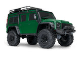 Green Traxxas TRX-4 Land Rover Defender RC truck shown from a three-quarter front angle.