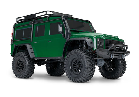 Green Traxxas TRX-4 Land Rover Defender RC truck shown from a three-quarter front angle.