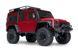 Red Traxxas TRX-4 Land Rover Defender RC model shown from a three-quarter front view.