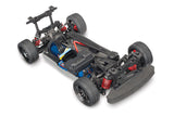 Traxxas 4-Tec 2.0 VXL chassis with detailed plastic components and mounting points for remote control car assembly.