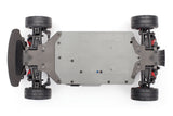 Traxxas 4-Tec 2.0 VXL chassis bottom view, showcasing the durable plastic construction and detailed design elements.