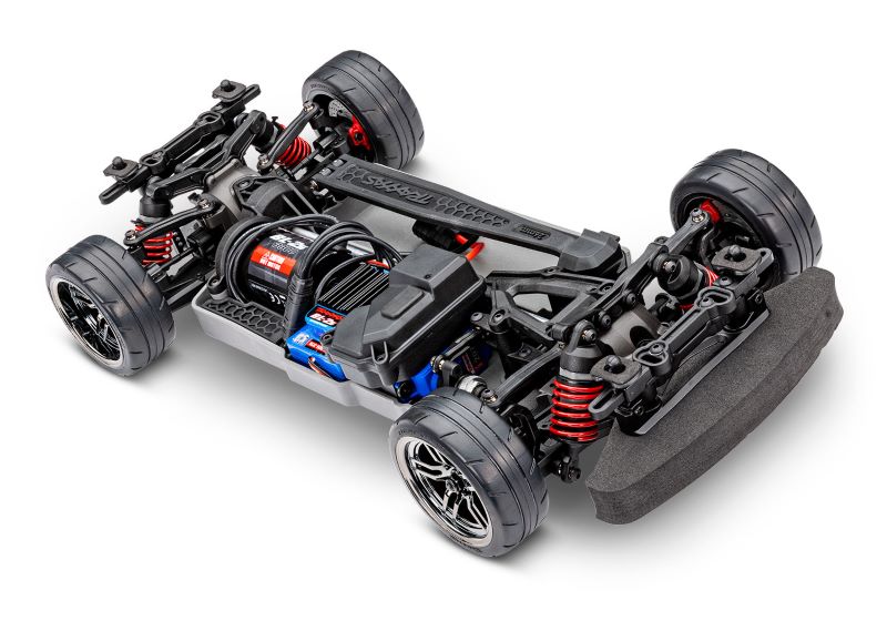 Traxxas 4-Tec 2.0 BL-2s chassis shown from a three-quarter front angle, featuring detailed construction and components.