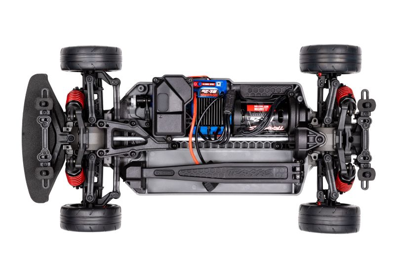 Traxxas 4-Tec 2.0 BL-2s chassis viewed from above, showing the detailed black plastic frame and mounting points for RC car build