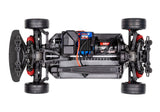 Traxxas 4-Tec 2.0 BL-2s chassis viewed from above, showing the detailed black plastic frame and mounting points for RC car build