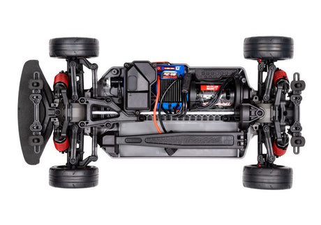 Traxxas 4-Tec 2.0 BL-2s chassis viewed from above, showing the detailed black plastic frame and mounting points for RC car build