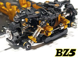 Pair of Atomic RC BZ5 Long Rear Metal Damper shocks for remote control cars, showing the silver metal construction and mounting hardware.