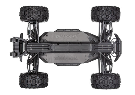 Bottom view of the Traxxas Maxx RC truck chassis with WideMaxx suspension, showing detailed components and sturdy build.