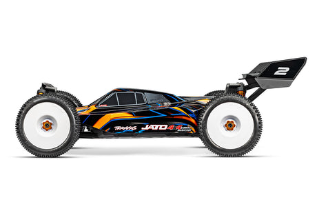 Traxxas Jato 4X4 VXL 4S RC car with orange body, shown from side-left angle, featuring off-road tires and detailed design.