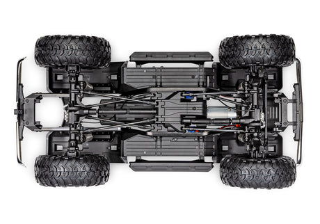 Traxxas TRX-4 Chevrolet K10 High Trail Edition RC truck chassis bottom view showing detailed suspension and drivetrain components.