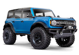 Traxxas TRX-4 2021 Ford Bronco 4x4 RTR crawler with detailed front quarter view and vibrant blue body.
