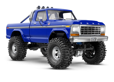 Traxxas TRX-4M 1/18 Ford F-150 High Trail Edition remote control truck, front view showing blue body and detailed design.