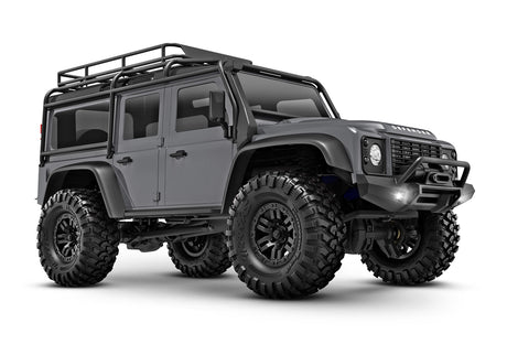 Traxxas TRX-4M Land Rover Defender radio-controlled scale model showing three-quarter front view with silver body.