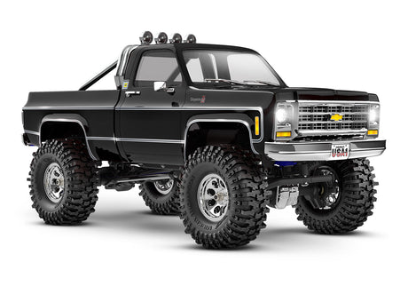 Traxxas TRX-4M Chevrolet K10 High Trail Edition RC truck, 1/18 scale, front three-quarter view in black.