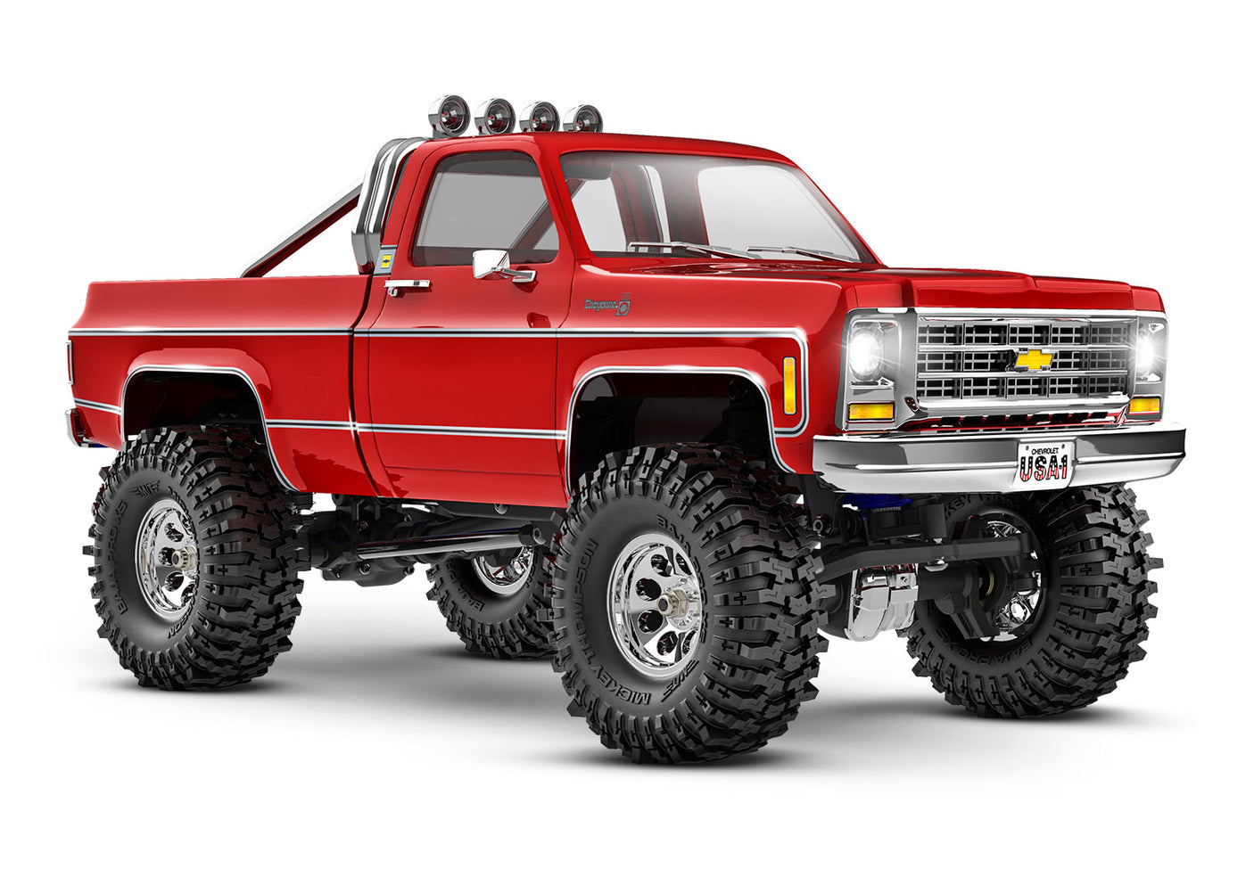 Red Traxxas TRX-4M 1/18 scale Chevrolet K10 High Trail Edition RC truck with detailed front view and off-road features.