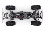 Traxxas TRX-4M 1/18 Ford F-150 High Trail Edition RC truck chassis bottom view showing detailed underside and suspension components.