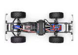 Overhead view of Traxxas TRX-4M 1/18 Ford F-150 High Trail Edition RC truck chassis showing detailed truck frame and components
