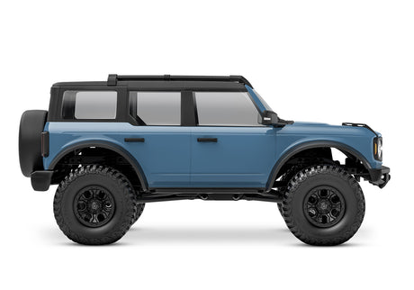 Traxxas TRX-4M Ford Bronco remote control truck with detailed side view showing off its rugged design and exterior features.