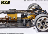 Atomic RC Z5 Belt Drive 4WD chassis kit with black and silver components, showing the detailed RC car frame and suspension parts.